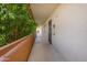 This community has well-maintained hallways and walkways with mature trees and landscaping at 7625 E Camelback Rd # B244, Scottsdale, AZ 85251