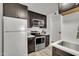 Renovated kitchen featuring stainless steel appliances and new cabinetry at 7625 E Camelback Rd # B244, Scottsdale, AZ 85251