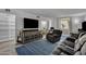 This living room with cozy sitting, TV and view to balcony and second bedroom at 7625 E Camelback Rd # B244, Scottsdale, AZ 85251