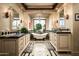 Bathroom with dual vanities, a soaking tub under a large window, and elegant fixtures at 7753 E Whisper Rock Trl, Scottsdale, AZ 85266