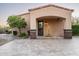 Charming front entry of a home with desert landscaping and a decorative entry way at 7753 E Whisper Rock Trl, Scottsdale, AZ 85266