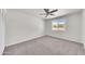 Large bedroom with plush carpet, a large window, and neutral walls, offering a calming and inviting atmosphere at 8146 N 17Th Dr, Phoenix, AZ 85021