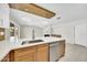 Bright, updated kitchen featuring stainless steel appliances, ample counter space, and modern lighting fixtures at 8146 N 17Th Dr, Phoenix, AZ 85021