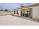 Spacious backyard featuring a covered patio and plenty of room for activities at 8404 W Coronado Rd, Phoenix, AZ 85037