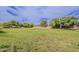 Expansive green grass open space and mature trees, perfect for recreation and relaxation at 8404 W Coronado Rd, Phoenix, AZ 85037