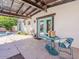 Charming patio area with cozy seating, ideal for enjoying outdoor living and entertaining by the pool at 8423 E Heatherbrae Dr, Scottsdale, AZ 85251