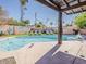 Relaxing backyard pool with inviting lounge chairs and Scottsdale mural, perfect for outdoor fun at 8423 E Heatherbrae Dr, Scottsdale, AZ 85251