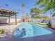 Gorgeous backyard with a sparkling pool, perfect for relaxation and enjoying sunny days at 8423 E Heatherbrae Dr, Scottsdale, AZ 85251