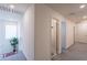 Upstairs hallway featuring neutral carpet, closet and a plant by the stairway at 8905 W Jefferson St, Tolleson, AZ 85353