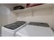 Convenient laundry room equipped with modern, front-load Samsung washer and dryer units at 8905 W Jefferson St, Tolleson, AZ 85353