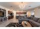 Open-concept living space seamlessly connects the living room, kitchen, and dining area at 8905 W Jefferson St, Tolleson, AZ 85353