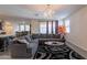 Spacious living room featuring a sectional couch and stylish area rug, creating an inviting atmosphere at 8905 W Jefferson St, Tolleson, AZ 85353