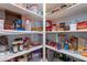 Walk-in pantry with lots of storage and shelving space at 8905 W Jefferson St, Tolleson, AZ 85353