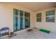 Covered patio with sliding glass doors offering seamless indoor-outdoor living at 8905 W Jefferson St, Tolleson, AZ 85353