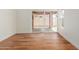 This bedroom includes laminate wood flooring and sliding glass doors to the backyard at 915 E Annette Dr, Phoenix, AZ 85022