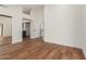 Spacious bedroom with laminate wood flooring and access to bathroom at 915 E Annette Dr, Phoenix, AZ 85022