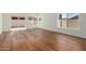 Bright living room with natural light, hardwood floors, and sliding doors leading to the patio at 915 E Annette Dr, Phoenix, AZ 85022