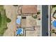 Expansive aerial view of a home featuring a private pool, solar panels, and low-maintenance landscaping at 12214 W Madison St, Avondale, AZ 85323