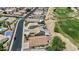 Neighborhood with a golf course view and lush landscaping at 12214 W Madison St, Avondale, AZ 85323