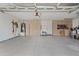 Spacious garage featuring built-in cabinets and ample storage space for organization at 12214 W Madison St, Avondale, AZ 85323