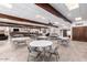 Spacious community clubhouse with multiple tables and seating areas at 131 N Higley Rd # 117, Mesa, AZ 85205