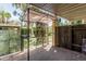 Outdoor patio area with modern privacy screens and shade structure for relaxing at 131 N Higley Rd # 117, Mesa, AZ 85205
