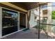 Private patio area with sliding glass door, and space for outdoor seating and entertaining at 131 N Higley Rd # 117, Mesa, AZ 85205