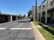 Street view of covered parking with street and landscaping in a community at 131 N Higley Rd # 117, Mesa, AZ 85205