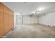 Spacious garage with built-in cabinets and storage space at 13857 W Windsor Ave, Goodyear, AZ 85395