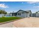 Charming backyard with a pool, patio, artificial turf, and a convenient storage shed at 1416 W Highland St, Chandler, AZ 85224