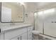 Bathroom with a single sink vanity and a glass shower at 1416 W Highland St, Chandler, AZ 85224