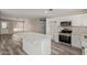 Well-equipped kitchen featuring a stylish island, stainless steel appliances, and modern finishes at 1416 W Highland St, Chandler, AZ 85224