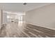 Open-concept living space with modern flooring, connecting seamlessly to the kitchen at 1416 W Highland St, Chandler, AZ 85224