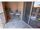 Cozy balcony featuring a metal table and chairs, ideal for relaxing outdoors at 14250 W Wigwam Blvd # 522, Litchfield Park, AZ 85340