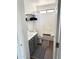 Clean bathroom features gray vanity, shower-tub combination, and black and white rugs at 1469 S Boulder St # C, Gilbert, AZ 85296