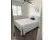 Charming bedroom with stylish patterned bedding, decorative wall art, and ceiling fan at 1469 S Boulder St # C, Gilbert, AZ 85296