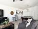 Spacious game room features a pool table, modern lighting, and comfortable seating perfect for entertaining guests at 1469 S Boulder St # C, Gilbert, AZ 85296