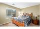 Cozy bedroom with natural light and comfortable furnishings at 1564 E Leaf Rd, San Tan Valley, AZ 85140