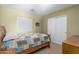 Bright bedroom with a window view and closet with sliding doors at 1564 E Leaf Rd, San Tan Valley, AZ 85140