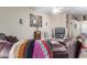 Well-lit living room with plush seating and stylish decor accents at 1564 E Leaf Rd, San Tan Valley, AZ 85140