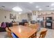 Inviting open-concept living and dining area with a seamless flow to the kitchen at 1564 E Leaf Rd, San Tan Valley, AZ 85140
