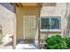 Inviting front entrance with security door and manicured green shrubbery at 17610 N 17Th Pl # 2, Phoenix, AZ 85022