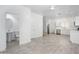 Bright and airy living space with tile floors, updated bathroom, and a seamless flow into the kitchen at 17610 N 17Th Pl # 2, Phoenix, AZ 85022