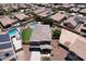 Aerial view of a suburban home featuring a private backyard with a pool and manicured lawn at 18351 W Southgate Ave, Goodyear, AZ 85338