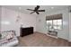Bright bedroom featuring charming décor and a large window at 18351 W Southgate Ave, Goodyear, AZ 85338
