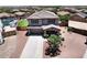 Two-story home featuring a well-maintained yard, a covered porch, and an attached two-car garage at 18351 W Southgate Ave, Goodyear, AZ 85338