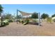 Modern playground with shaded play equipment and climbing structures in a community park at 18351 W Southgate Ave, Goodyear, AZ 85338