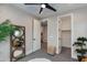 Bedroom with a walk in closet, doorways leading to other rooms, and modern decor at 1910 W Desert Hollow Dr, Phoenix, AZ 85085