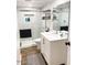 Modern bathroom with a glass-enclosed shower, sleek vanity, and stylish neutral accents at 20 S Buena Vista Ave # 111, Gilbert, AZ 85296