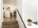 View of the kitchen island with white countertop from the staircase landing at 20 S Buena Vista Ave # 111, Gilbert, AZ 85296